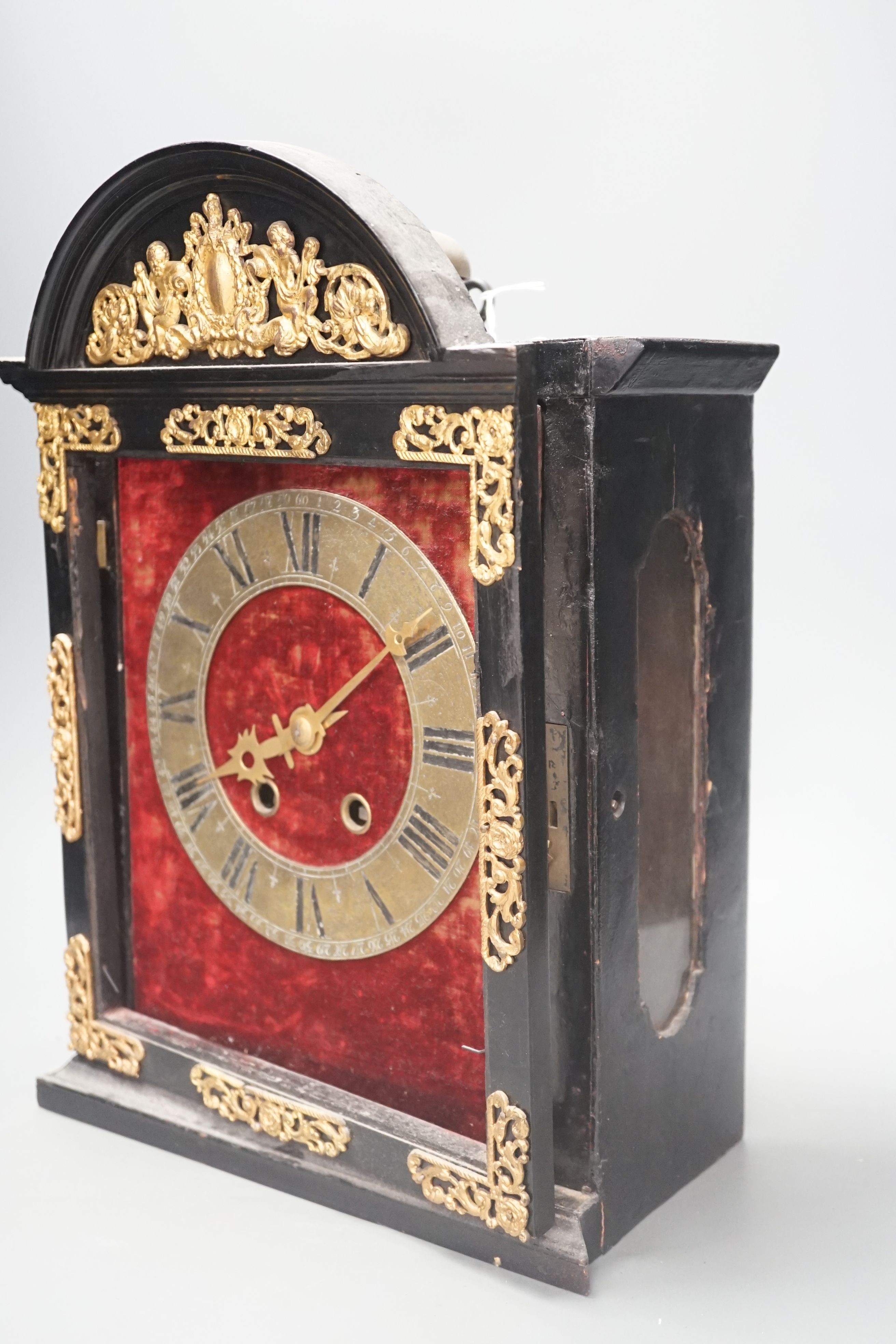 A 19th century replica of a 17th century Religieuse clock, 38cm